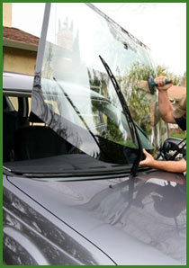 Glass Tech Auto technician installing a windshield
